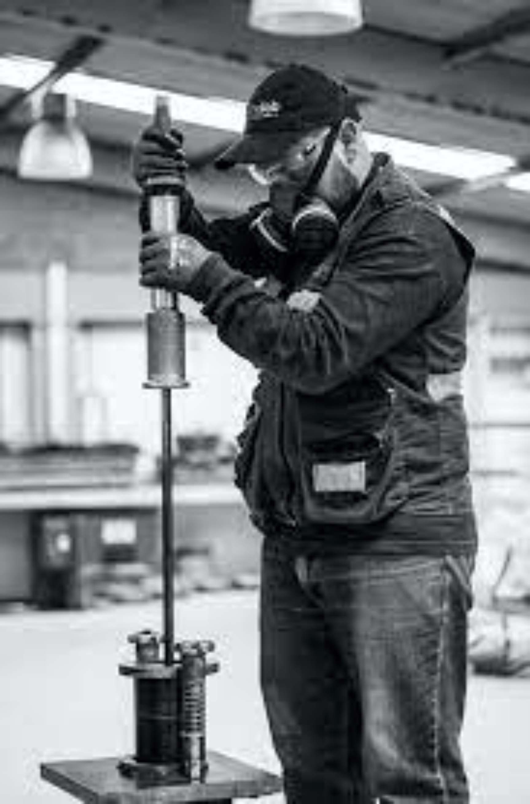Technician performing an asphalt extraction test